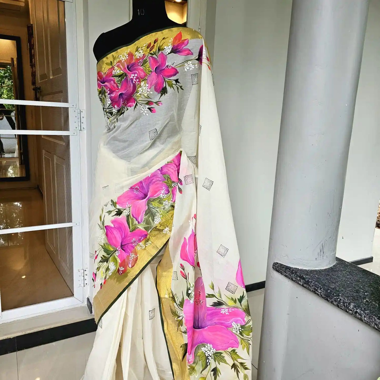 Kerala tradition meets hand-painted elegance