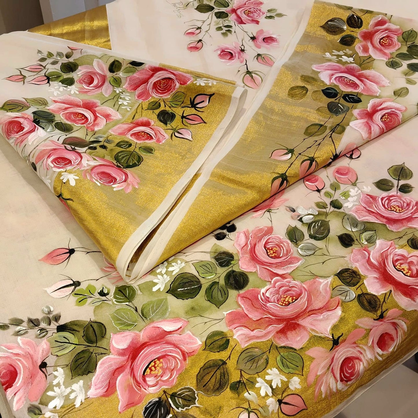 Elegant Kasavu Saree With Delicate Rose Art