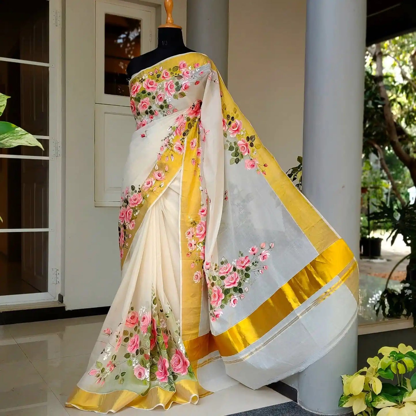 Elegant Kasavu Saree With Delicate Rose Art
