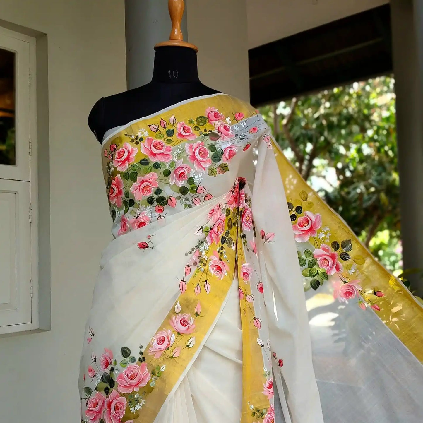 Elegant Kasavu Saree With Delicate Rose Art